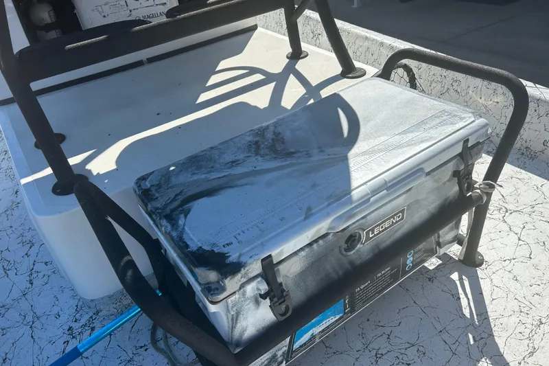 Slide: The Image of 2020 Dargel Kat 250 HDX boat with a Legend cooler on deck. - 17