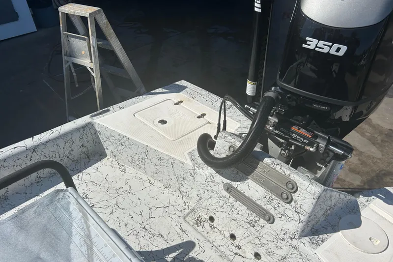 Slide: The Image of 2020 Dargel Kat 250 HDX boat with powerful 350 engine, detailed deck view. - 18