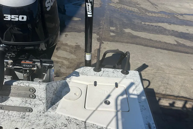 Slide: The Image of 2020 Dargel Kat 250 HDX boat with Suzuki 350 engine, docked on concrete surface. - 19