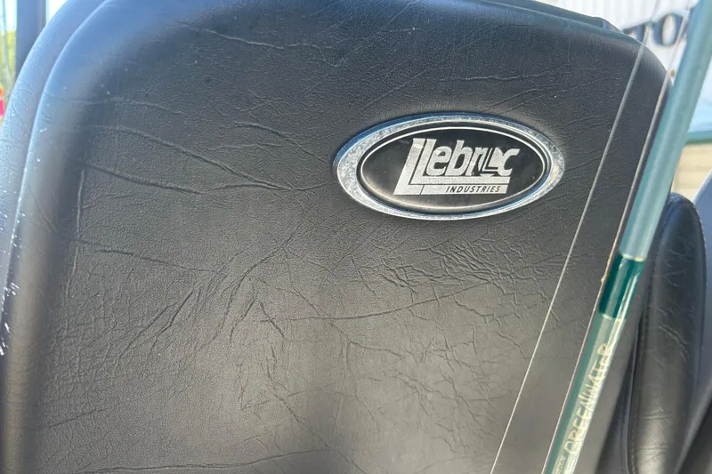 Slide: The Image of Close-up of a black leather seat with a Lebroc Industries logo, 2020 Dargel Kat 250 HDX. - 21
