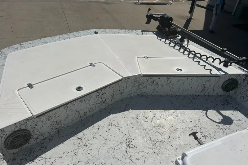 Slide: The Image of 2020 Dargel Kat 250 HDX boat deck with storage compartments and trolling motor. - 26