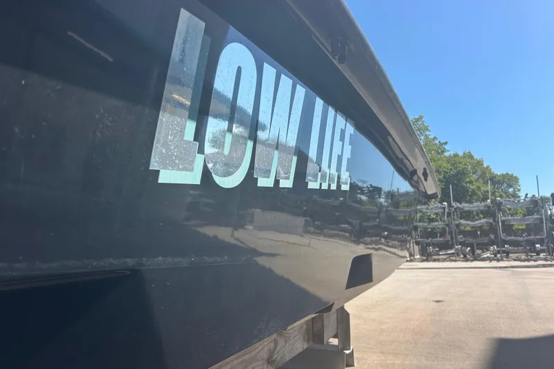 Slide: The Image of 2020 Dargel Kat 250 HDX boat with "LOW LIFE" text on the side. - 44