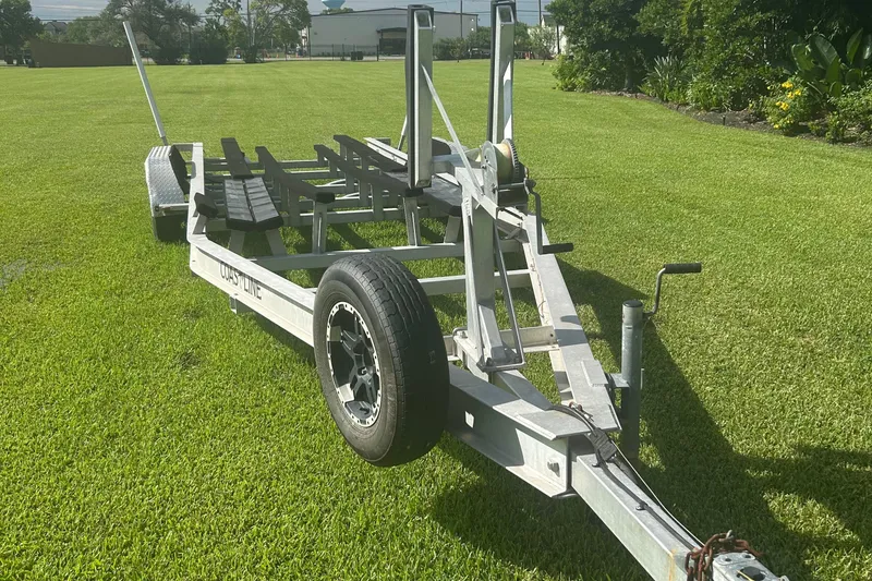 Slide: The Image of Trailer for 2020 Dargel Kat 250 HDX on grassy field, featuring sturdy metal frame. - 53