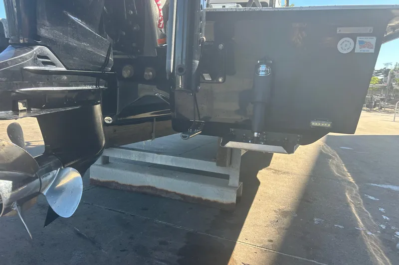 Slide: The Image of 2020 Dargel Kat 250 HDX boat's rear view with propeller and hydraulic components. - 8