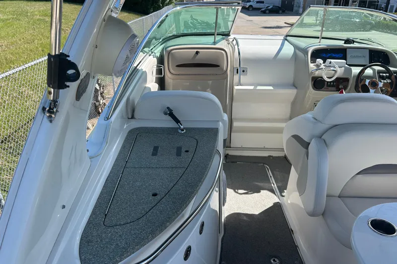Slide: The Image of 2008 Chaparral 275 SSi boat interior with seating, steering wheel, and control panel. - 11