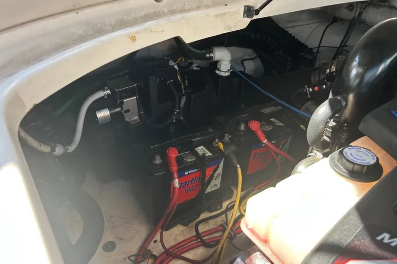 Slide: The Image of Engine compartment of 2008 Chaparral 275 SSi with dual batteries and wiring. - 14