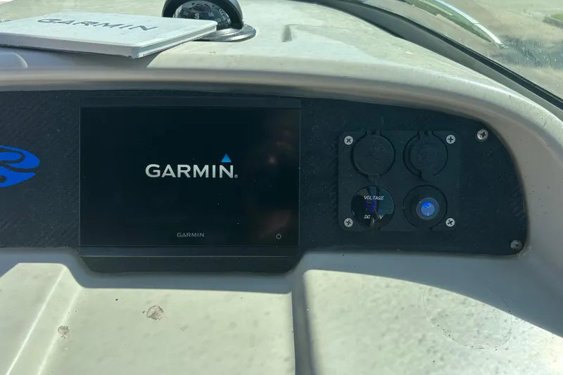 Slide: The Image of Dashboard of 2008 Chaparral 275 SSi with Garmin display and voltage meter. - 32
