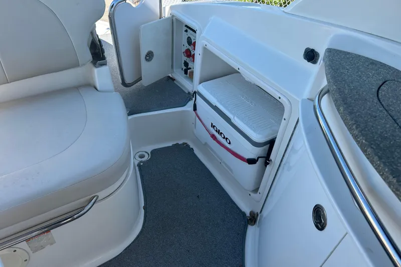 Slide: The Image of 2008 Chaparral 275 SSi boat interior with Igloo cooler storage compartment. - 40