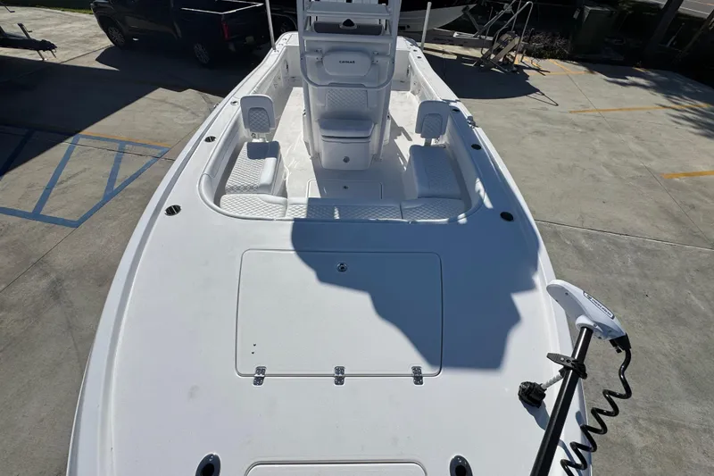 Slide: The Image of 2026 Caymas 281 HB boat deck, featuring spacious seating and modern design. - 25