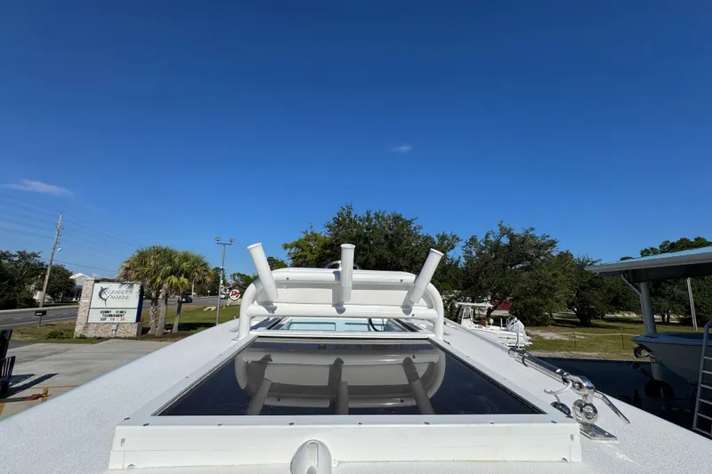 Slide: The Image of 2026 Caymas 281 HB boat roof with clear blue sky background. - 38