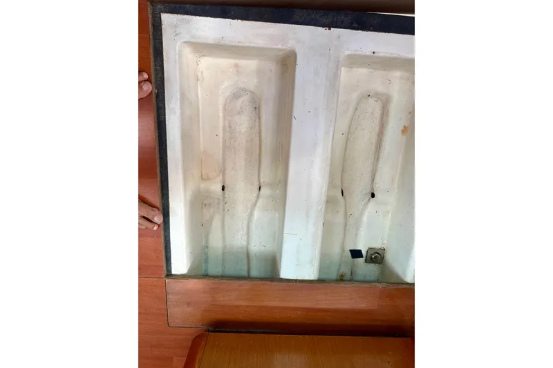 Slide: The Image of Bilge area of 2010 Beneteau Oceanis 40 sailboat with hoses and wiring. - 56