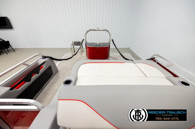 Slide: The Image of 2026 Avalon VEN85 VRB boat interior with modern seating and sleek design in showroom. - 15