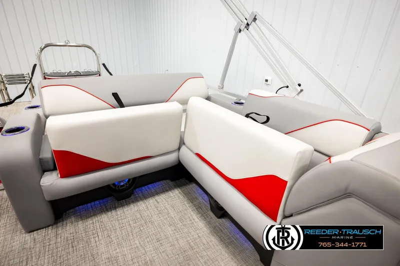 Slide: The Image of 2026 Avalon VEN85 VRB boat interior with modern seating and red accents. - 24