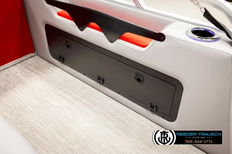 Slide: The Image of Interior of 2026 Avalon VEN85 VRB boat with storage compartment and cup holder. - 29