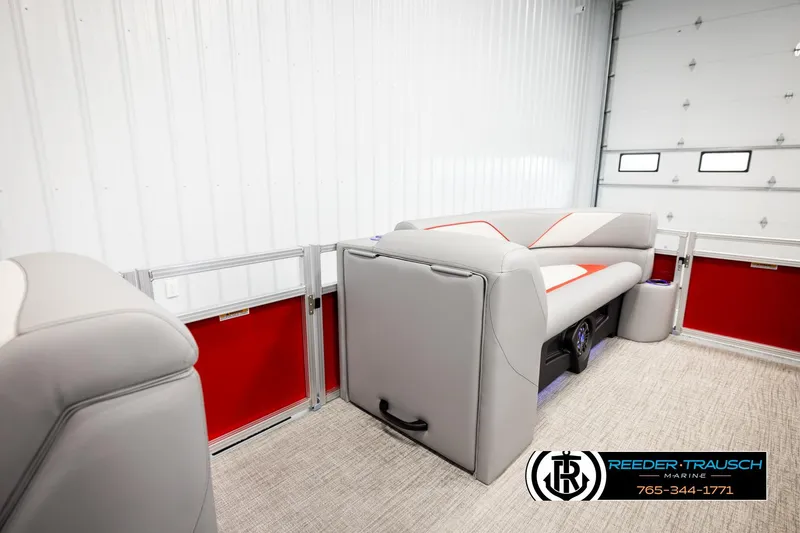 Slide: The Image of 2026 Avalon VEN85 VRB interior with modern seating and red accents in a showroom. - 31