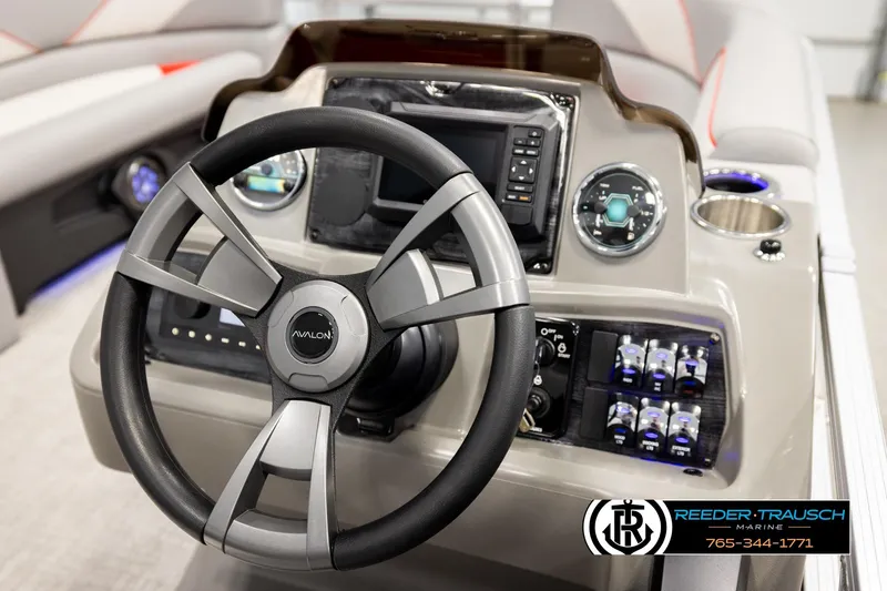 Slide: The Image of 2026 Avalon VEN85 VRB boat dashboard with steering wheel and control panel. - 33