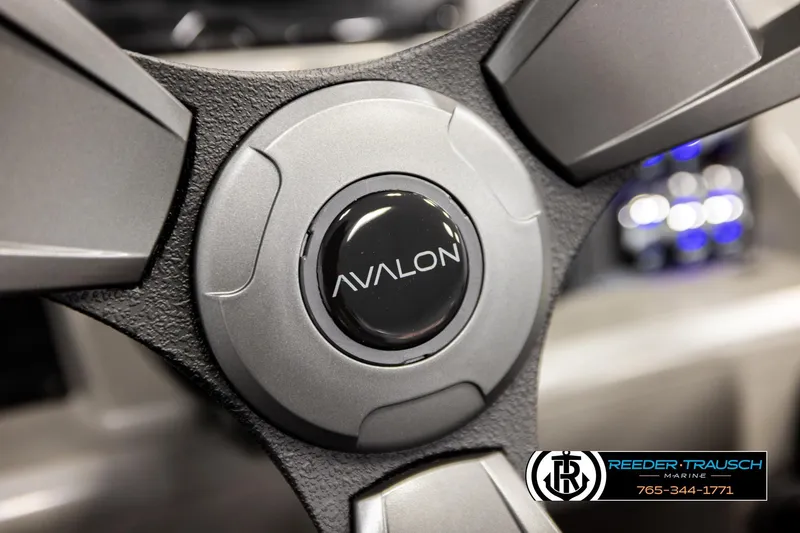 Slide: The Image of Steering wheel of 2026 Avalon VEN85 VRB boat with logo, Reeder-Trausch Marine branding. - 35