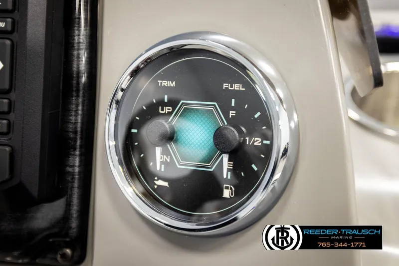 Slide: The Image of Close-up of Avalon VEN85 VRB 2026 dashboard gauge showing trim and fuel levels. - 39