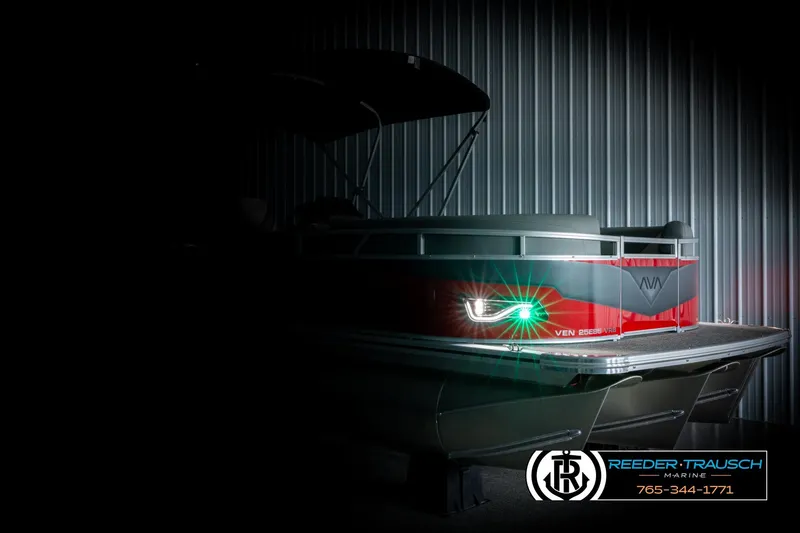 Slide: The Image of 2026 Avalon VEN85 VRB pontoon boat with illuminated lights, showcased by Reeder-Trausch Marine. - 4