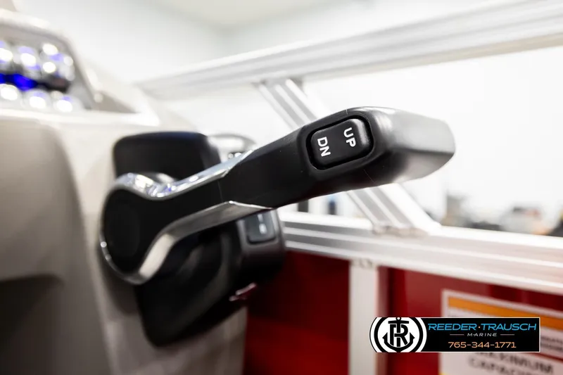 Slide: The Image of Close-up of Avalon VEN85 VRB 2026 boat throttle lever with "UP" and "DN" buttons. - 41