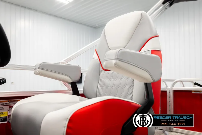 Slide: The Image of 2026 Avalon VEN85 VRB boat seat with red and white upholstery in a showroom. - 42