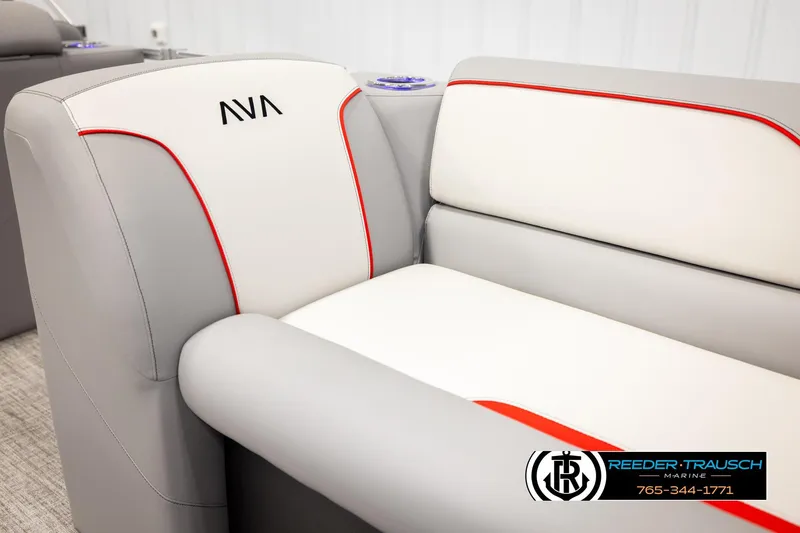 Slide: The Image of 2026 Avalon VEN85 VRB boat seat with gray and white upholstery, red accents, and cup holder. - 43