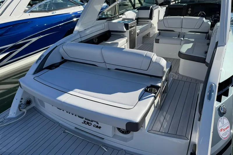 Slide: The Image of 2026 Formula 330 Crossover Bowrider OB with luxurious seating and sleek design. - 8