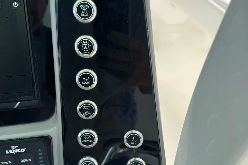 Slide: The Image of Control panel of 2021 Robalo R272 Center Console boat with labeled buttons. - 16