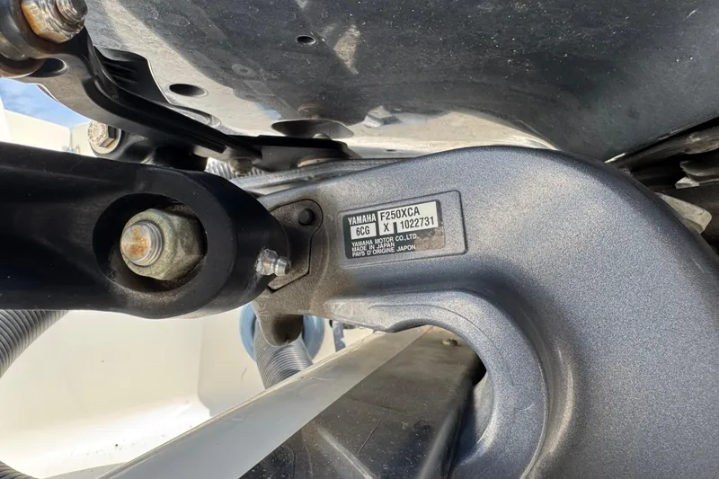 Slide: The Image of Close-up of Yamaha F250XCA engine part on 2021 Robalo R272 Center Console boat. - 27