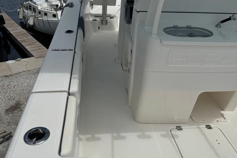 Slide: The Image of 2021 Robalo R272 Center Console boat interior with seating and console details. - 8