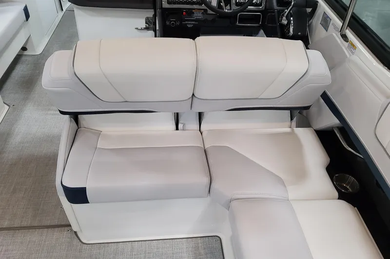Slide: The Image of 2026 Formula 330 Crossover Bowrider OB interior seating, featuring luxurious white upholstery. - 25