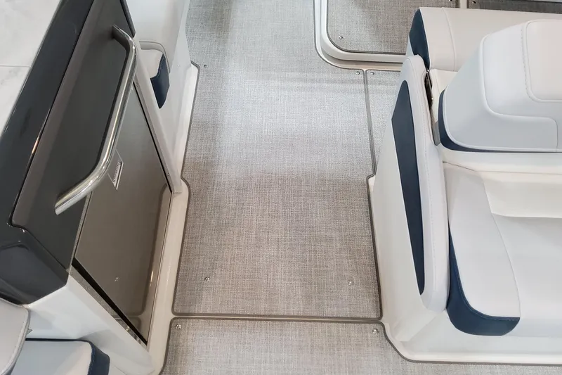 Slide: The Image of 2026 Formula 330 Crossover Bowrider OB interior with sleek seating and modern flooring. - 34