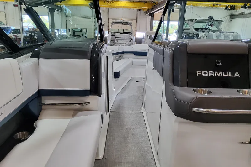 Slide: The Image of 2026 Formula 330 Crossover Bowrider OB interior with sleek seating and modern design. - 39