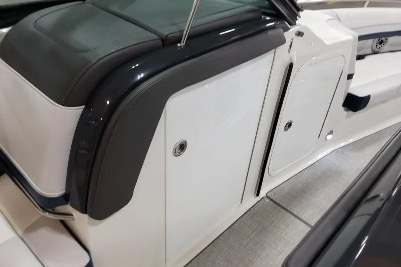 Slide: The Image of 2026 Formula 330 Crossover Bowrider OB interior, featuring sleek seating and storage compartments. - 40