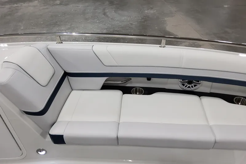 Slide: The Image of 2026 Formula 330 Crossover Bowrider OB interior with white seating and cup holders. - 45