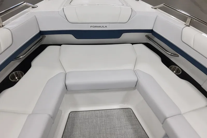 Slide: The Image of 2026 Formula 330 Crossover Bowrider OB interior with white seating and stainless steel accents. - 47