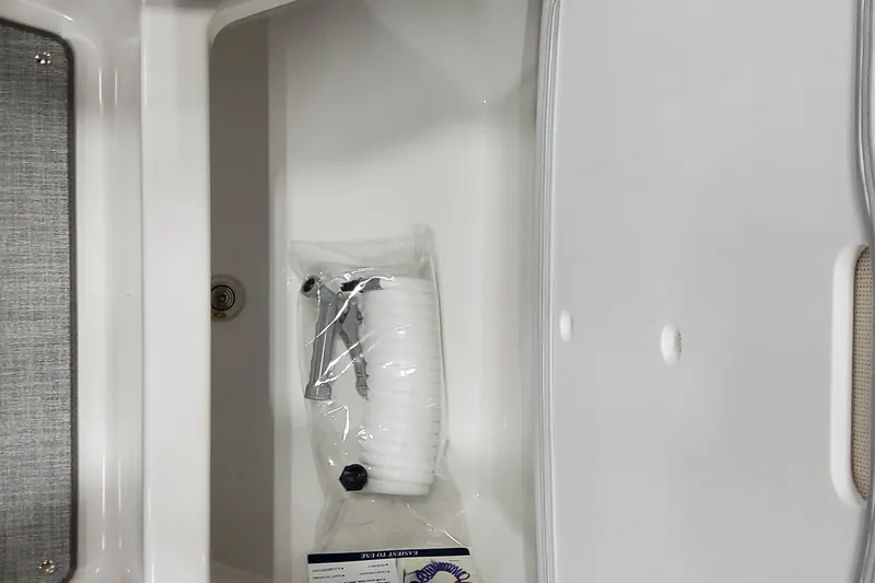 Slide: The Image of Storage compartment in 2026 Formula 330 Crossover Bowrider OB with accessories. - 48