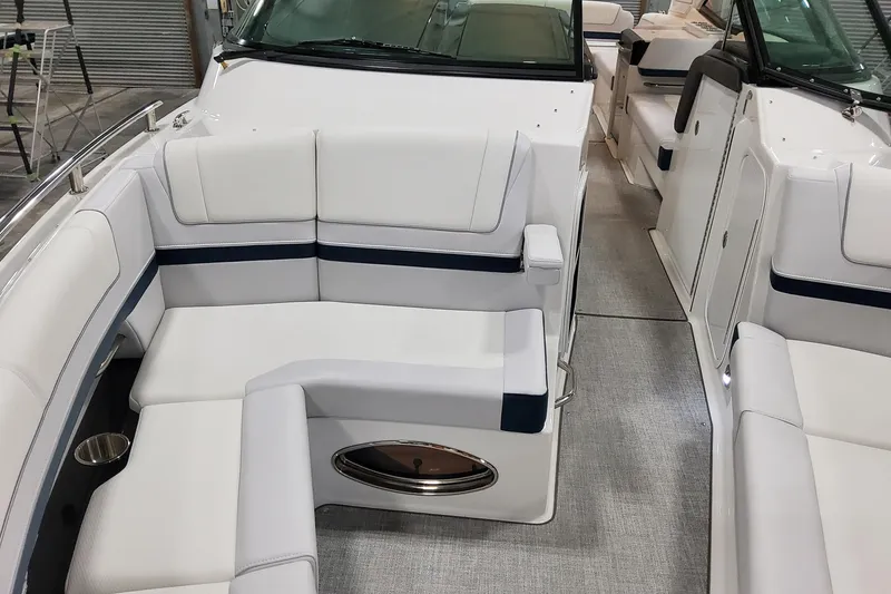 Slide: The Image of 2026 Formula 330 Crossover Bowrider OB interior with white seating and modern design. - 50