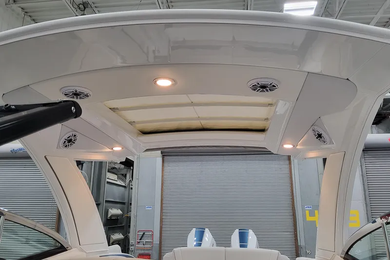 Slide: The Image of 2026 Formula 330 Crossover Bowrider OB interior with speakers and lighting. - 53