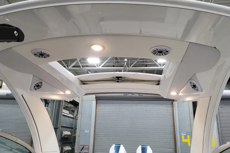 Slide: The Image of 2026 Formula 330 Crossover Bowrider OB interior with speakers and lighting. - 54