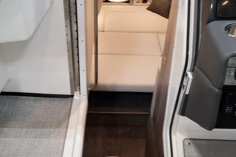 Slide: The Image of Interior view of 2026 Formula 330 Crossover Bowrider OB, featuring sleek seating and modern design. - 57