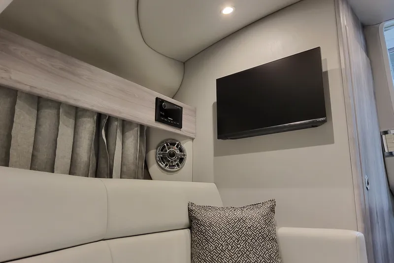 Slide: The Image of Interior of 2026 Formula 330 Crossover Bowrider OB with TV and speaker system. - 67