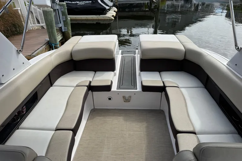 Slide: The Image of 2015 Regal 2700 Bowrider interior with spacious seating and elegant design. - 16