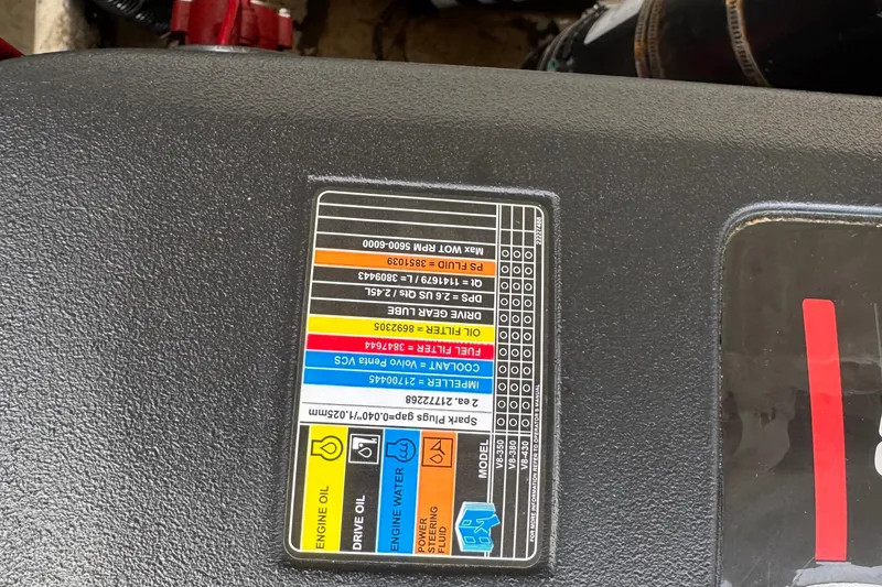Slide: The Image of Engine specifications label on a 2015 Regal 2700 Bowrider boat. - 20