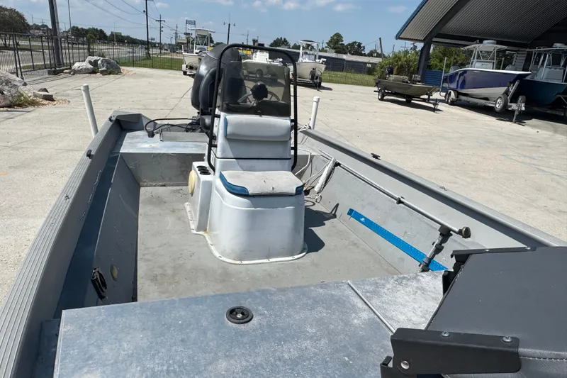 Slide: The Image of 2009 G3 1860 CC boat with center console, parked outdoors on concrete. - 14