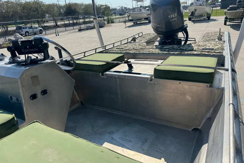 Slide: The Image of Hanko 19 SC boat interior with green cushions and Yamaha 90 engine, 2013 model. - 20