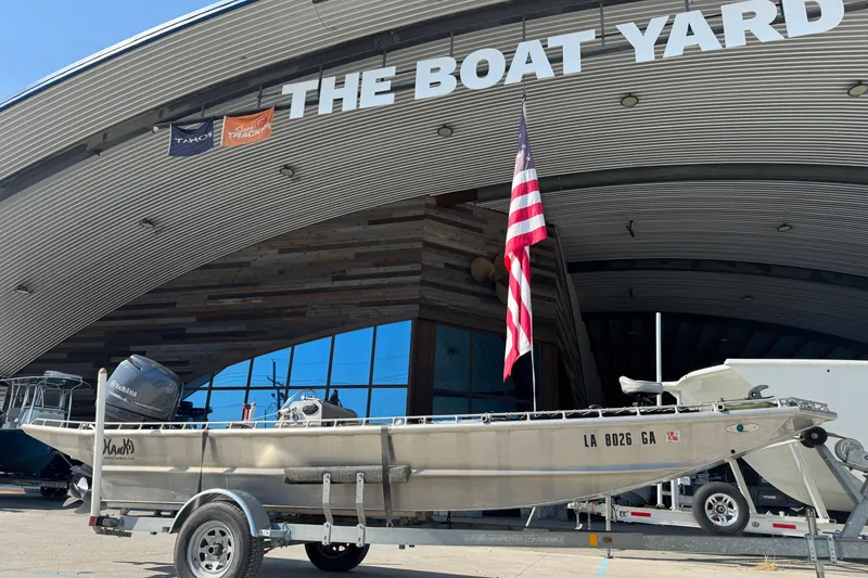 Slide: The Image of 2013 Hanko 19 SC boat on trailer at The Boat Yard with American flag. - 6