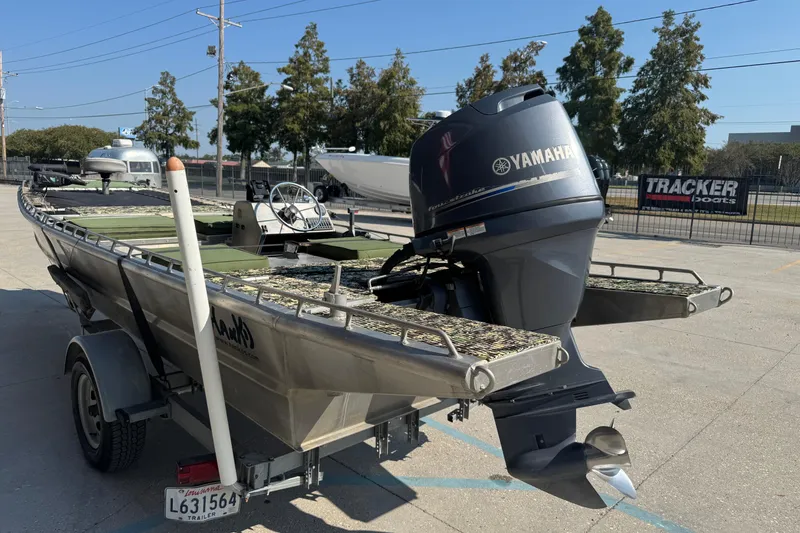 Slide: The Image of 2013 Hanko 19 SC boat with Yamaha outboard motor on trailer. - 8