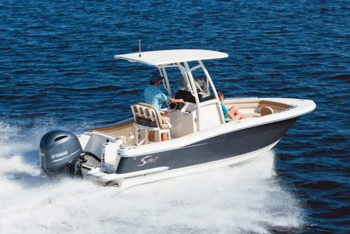 Slide: The Image of Manufacturer Provided Image: 2025 Scout 215 XSF boat cruising on open water. - 15