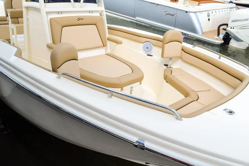 Slide: The Image of Manufacturer Provided Image: 2025 Scout 215 XSF boat with beige seating and sleek design. - 20